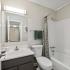 bathroom sink, shower, and toilet
