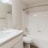 bathroom sink, shower, and toilet