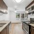 kitchen with stainless steel appliances and wood cabinets