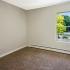 Vacant bedroom with large window