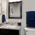 Bathroom with one sink, toilet, and shower
