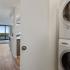 In-unit stacked washer and dryer