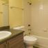 Bathroom with one sink, toilet, and shower