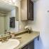 Bathroom with one sink, toilet, and shower