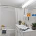 Bathroom with one sink, toilet, and shower