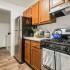 kitchen with stainless steel appliances and wood cabinets