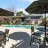 pool with tables and chairs