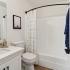 bathroom, sink, shower, and toilet