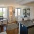 Arabella 101, interior, kitchen, dining room, study, open concept, dishwasher, large windows, wood floor, area rug, dark cabinets