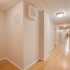 long bright hallway with doors