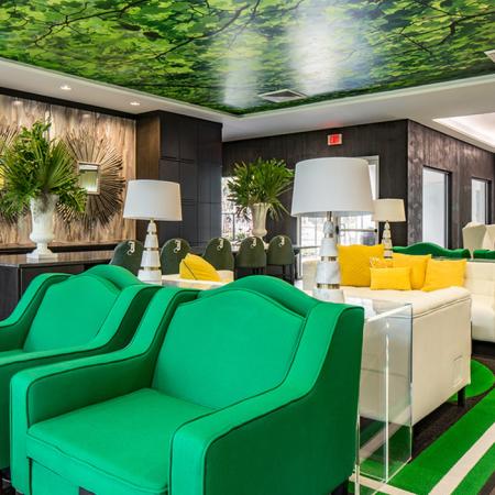 1800 The Ivy, interior, white, black, yellow, green decor, sofas, pillows, bar seating,