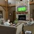 Soldiers taking in the sitting area in the Lodge Clubhouse | Fort Drum Apartments
