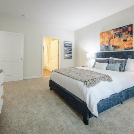 Spacious bedroom with carpet  at Mill & 3 | Apartments For Rent Chelmsford MA
