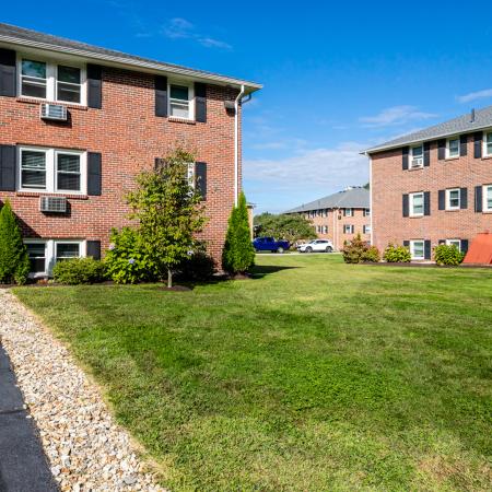 Exterior view from parking area | Princeton Dover | Dover NH Apartment Buildings