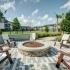 Fire pit with patio furniture  | Apartments In Clermont FL | Castle Hill
