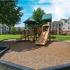 Playground with View of Apartment Buildings  | Apartments On Beltway 8 | Advenir at Wynstone