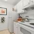 Fully Equipped Kitchen with oven, range, and refrigerator. | Advenir at San Tropez