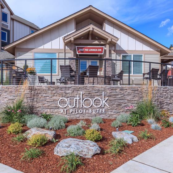 Exterior Building with Beautiful Grounds | Outlook at Pilot Butte Apartments | Bend OR Apartments for Rent