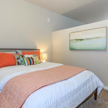 Neutral colored walls and carpet in spacious bedroom. | Outlook at Pilot Butte Apartments | Apartments Bend Oregon