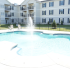 The Belvedere Apartments, exterior, sparkling blue swimming pool, building exteriors, balconies