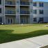 The Belvedere Apartments, exterior, outdoor putting green, building view with balconies, walkways, street lamp