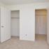 Carpeted bedroom with closet at Willow Ridge Apartments in Marlton, NJ.