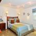 Decorated bedroom with blue decor at Country Manor apartments for rent in Levittown, PA