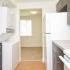 Greenville on 141 Sample Kitchen with Washer and Dryer and Dining Room View | Apartments Near Wilmington DE
