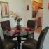 Model dining area off the kitchen furnished with a circular table and 4 chairs at Park City in Lancaster, PA.