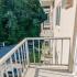 Balcony view of parking lot with neighbor balcony views at Gayley Park apartments for rent in Media, PA