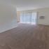 Living room with beige carpet and a closet at Black Hawk apartments for rent in Downingtown, PA