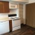 kitchen with white appliances at Silver Springs Apartments in Springfield MO