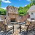 Outdoor Fireplace, Patio & Seating | Deacon's Station Apartments | 4 Bedroom Apartments In Winston-Salem, NC