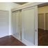 Homeroom Lofts Apartments, interior, bedroom, sliding doors, wood flooring