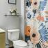 Bathroom with floral shower curtain