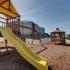 Coryell Courts Apartments amenity kids playground with slide and swing
