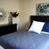 Coryell Crossing Apartments in Springfield, MO - furnished bedroom - TLC Properties