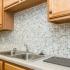 Tiled Wall behind Sink in Kitchen | Apartments For Rent In Manhattan KS | Westchester Park Apartments