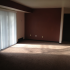Sugar Plum Apartments Traverse City Michigan open large living room with sliding glass doors