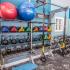 Lexington Crossing fitness center with free weights and yoga balls