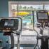 Lexington Crossing fitness center with treadmills and view out the window.