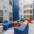 College Park and Midtown Interior Courtyard with blue and orange seating.