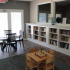 Clubhouse area: peaceful seating, children activities, books, Large windows and doors.