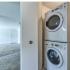 Americana Southdale Apts; Interior, full size washer dryer in hall area, Light in closet