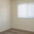A room with a grey carpet and light walls.  | Homes for rent near Holloman AFB, Alamogordo, NM
