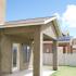A backyard patio and lawn. | Alamogordo Homes for rent near Holloman AFB, NM