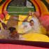 People sliding on slip and slide at community event | Apartment Rentals Watertown NY