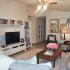 Decorated living room | TV center | Fort Cavazos Homes | killeen homes for rent
