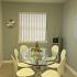 Dining room with glass table and 6 chairs | Cavalry Family Housing Office | Fort Cavazos apartments
