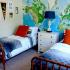 Child's Bedroom | 2 twin beds | World map wallpaper